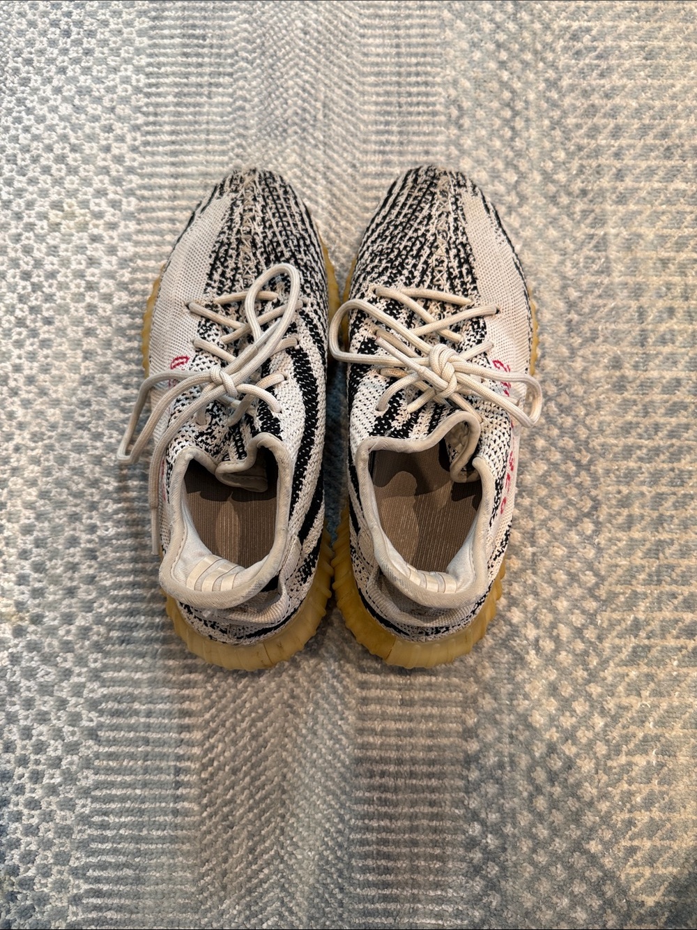 Yeezy Boost Sneakers in White, Black and Yellow Sole